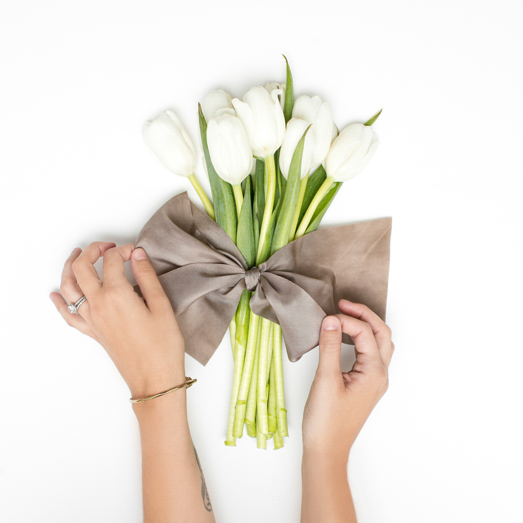 10 wedding hacks every couple should know, tulips tied together with a bow