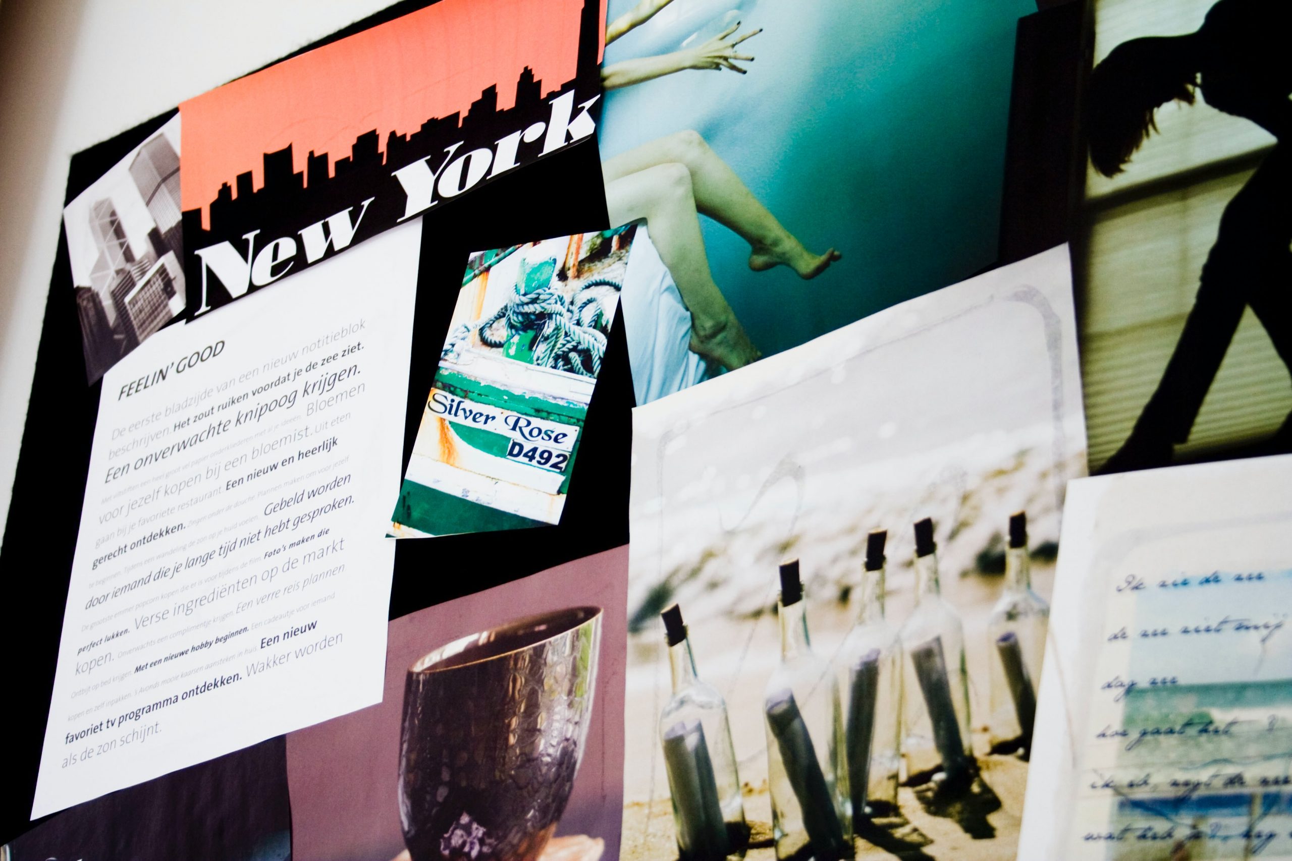 images of bottles on a beach, new york city skyline, coffee mug, and letter pinned to a cork board